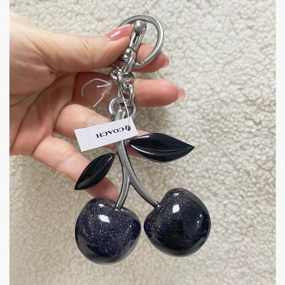 Coach Black Cherry Keychain with Silver Accents